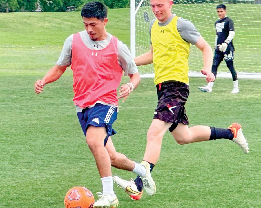 Ivan Villatorro and Luca Marfisi practice during tryouts for next season’s team.