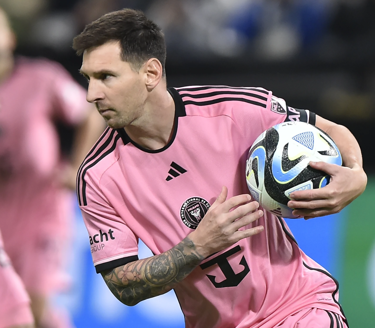 Lionel Messi runs with the ball during the Riyadh soccer match in Saudi Arabia, Jan. 29.