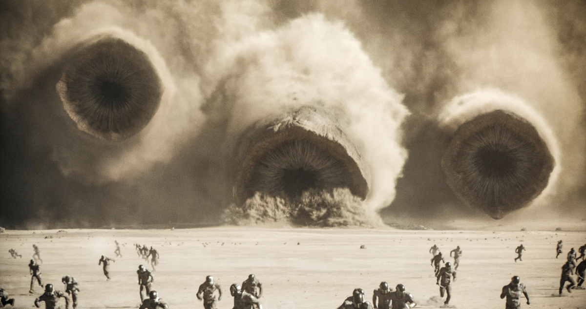 The giant sand worms of the planet Arrakis chasing Harkonnen soldiers in the Fremen attack against the duke in “Dune: Part Two.”