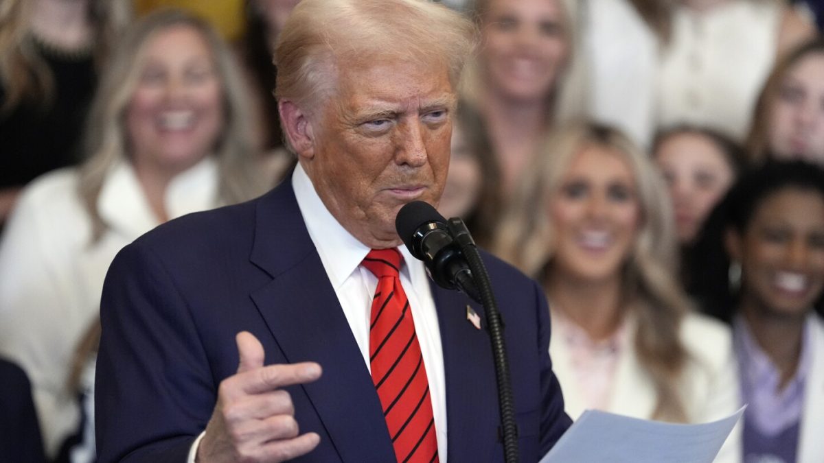 Trump speaks before signing the order banning transgender female athletes from women’s sports.