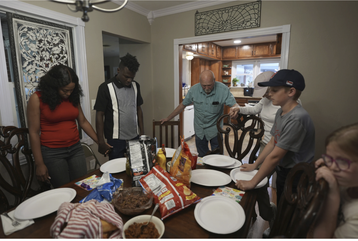 Haitian immigrants have lunch with their neighbors in Panhandle, Texas.
