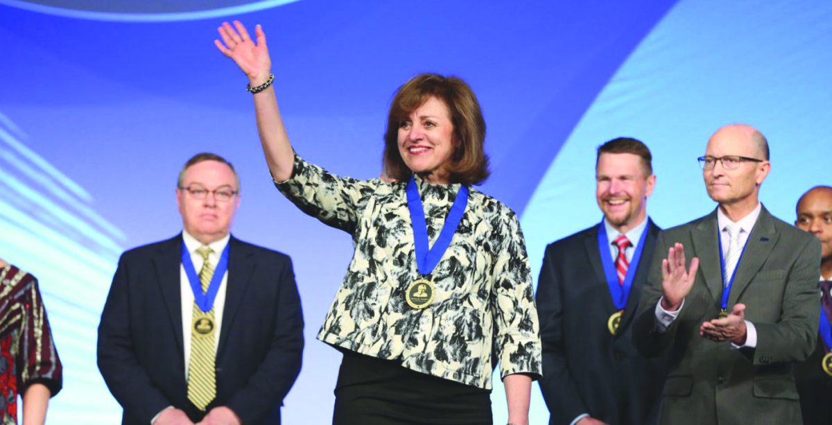 Dr. Kay Eggleston receives the Shirley B. Gordon Award of Distinction at Phi Theta Kappa’s annual convention in 2017.